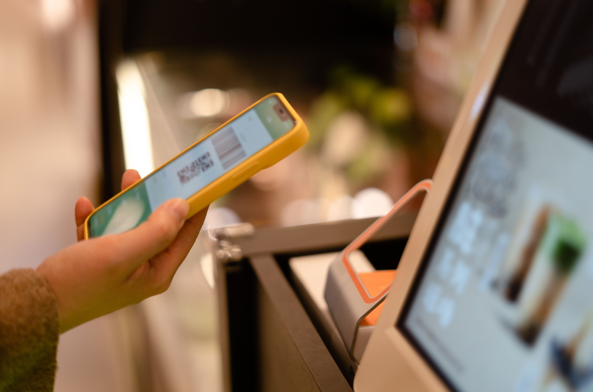 Pay with your phone at a self-service checkout machine